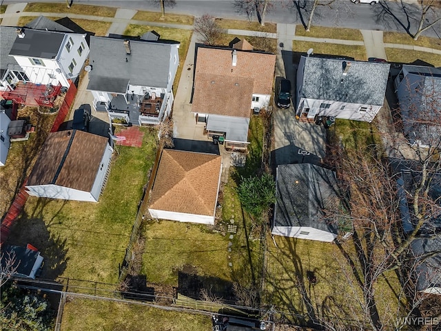 birds eye view of property with a residential view