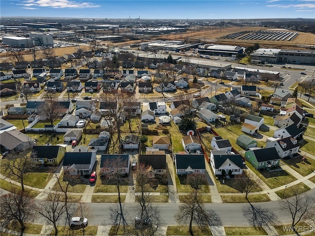 birds eye view of property with a residential view