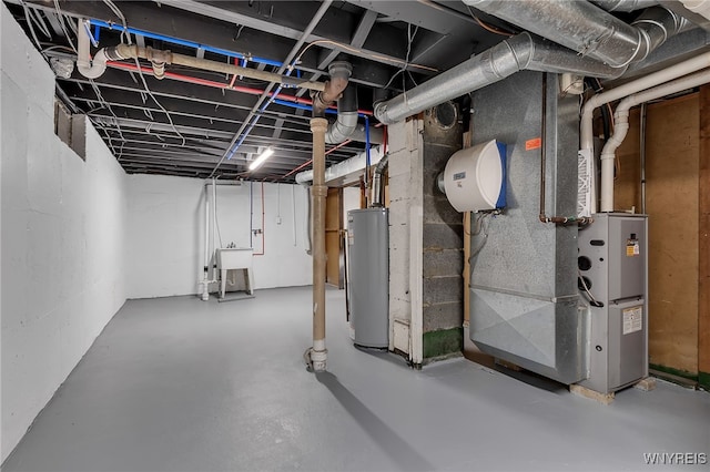 unfinished basement featuring a sink and water heater