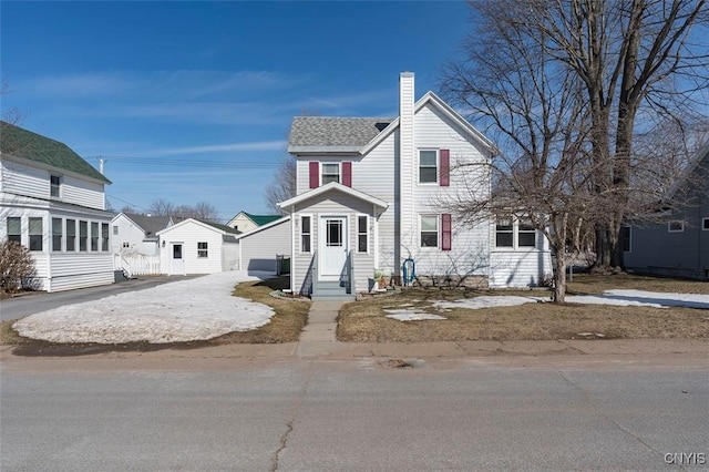 view of front of property with a chimney