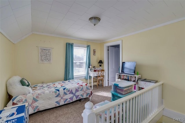 carpeted bedroom with baseboard heating, crown molding, and lofted ceiling