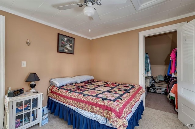 bedroom with light carpet and ceiling fan