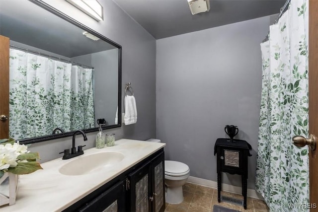 full bath with baseboards, toilet, a shower with curtain, tile patterned floors, and vanity