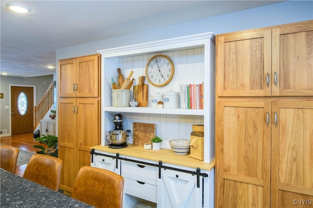 kitchen with visible vents and backsplash