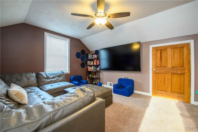 living room featuring a ceiling fan, baseboards, carpet floors, visible vents, and vaulted ceiling