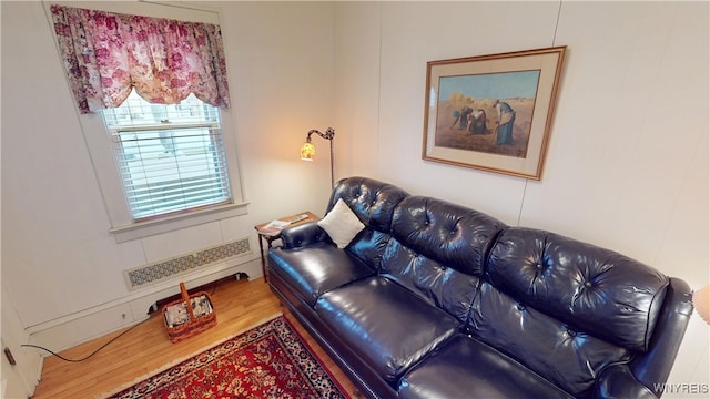 living room with wood finished floors