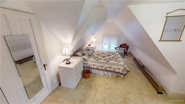 bedroom with baseboards, light carpet, baseboard heating, and lofted ceiling