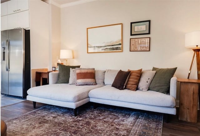 living room with ornamental molding and dark wood-style flooring