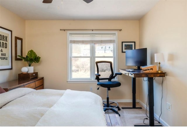 bedroom featuring baseboards