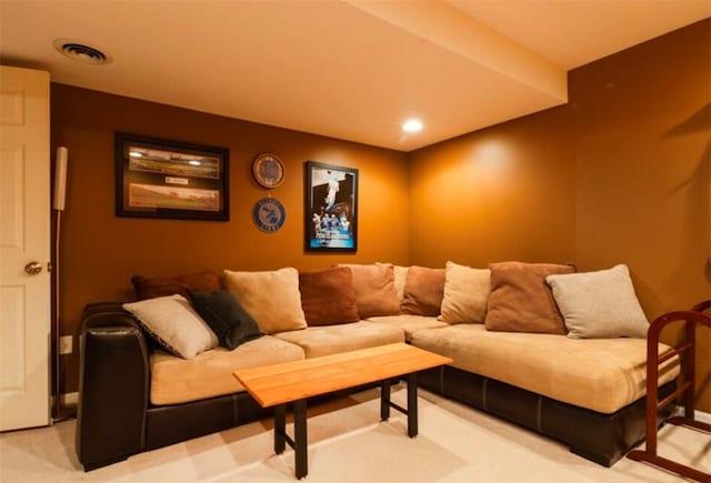 living area with visible vents and recessed lighting