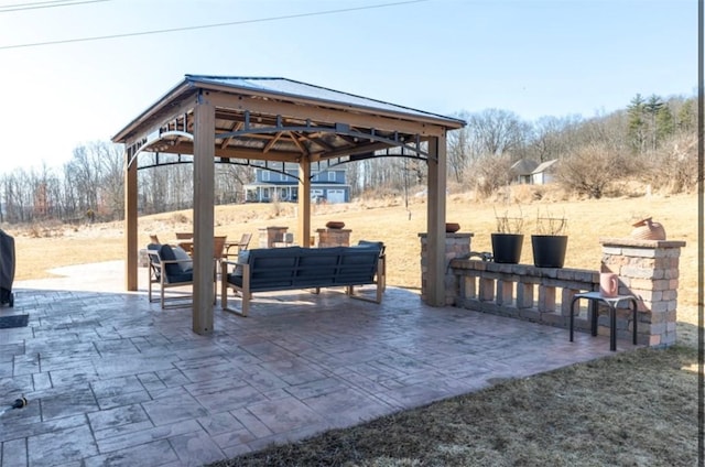 view of patio featuring a gazebo