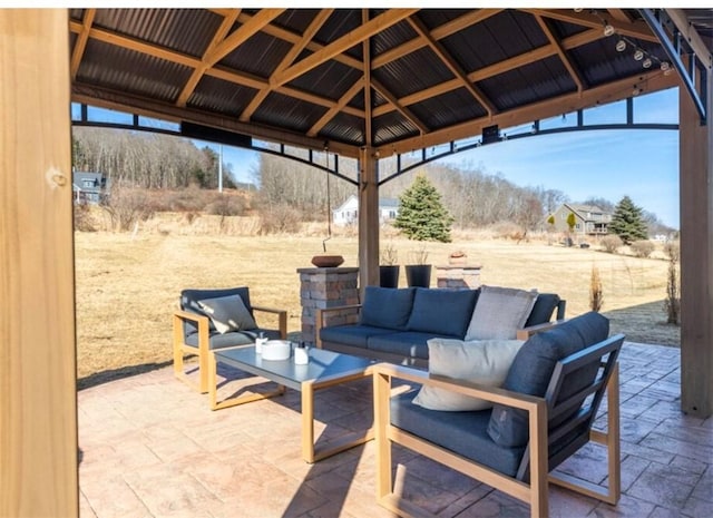 view of patio / terrace featuring a gazebo and an outdoor living space