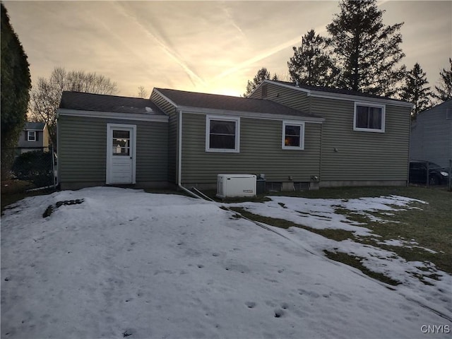 view of snow covered house