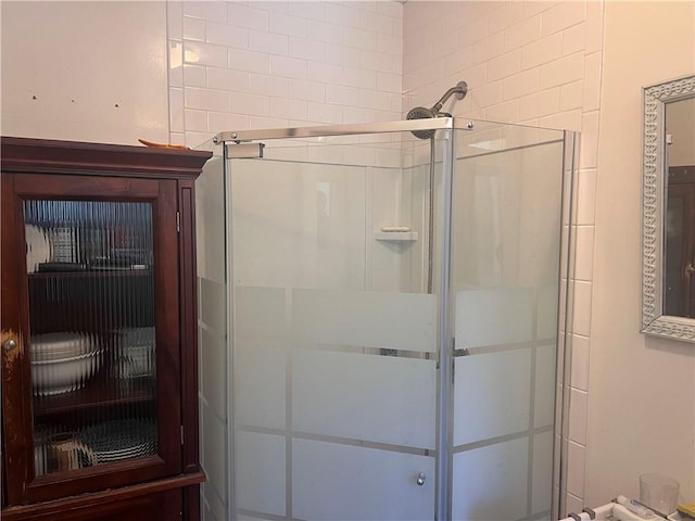 full bath featuring a stall shower