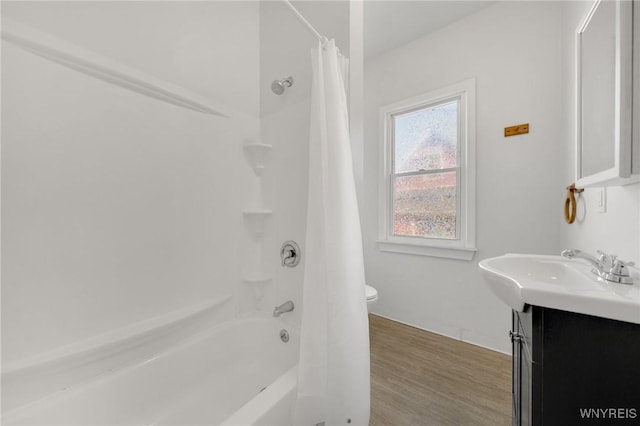 full bath featuring vanity, shower / bath combination with curtain, toilet, and wood finished floors