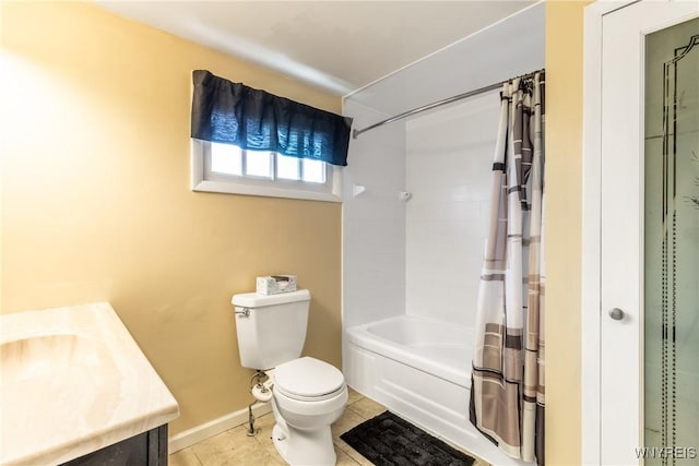 bathroom with baseboards, toilet, tile patterned floors, shower / bath combination with curtain, and vanity