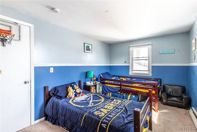 bedroom featuring baseboards, carpet floors, and baseboard heating