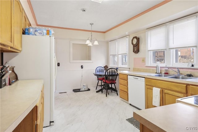 kitchen featuring marble finish floor, ornamental molding, a sink, white appliances, and light countertops