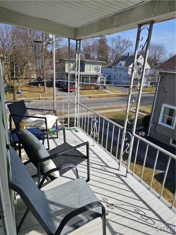 exterior space with a residential view and a porch