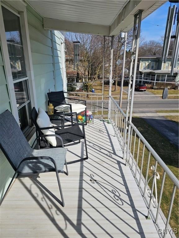 wooden terrace featuring a porch