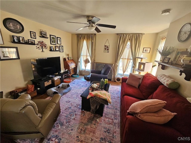 living area featuring ceiling fan