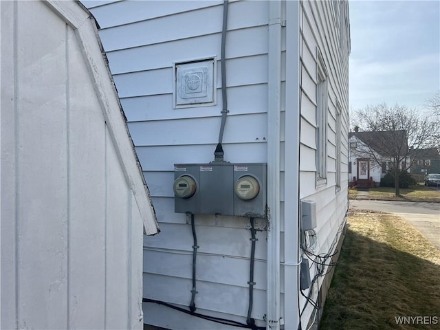 exterior details featuring electric meter