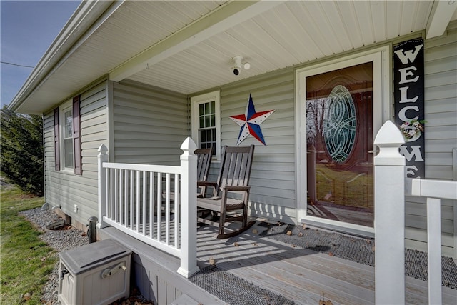 wooden terrace featuring a porch