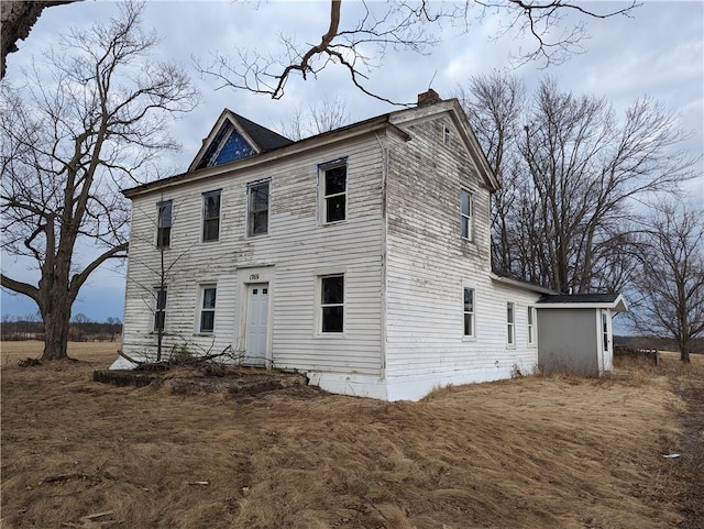 colonial home with a chimney