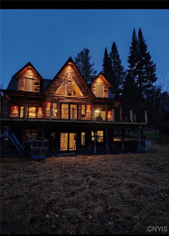 1392 Big Moose Rd, Webb, NY 13331 - view of back of house at night