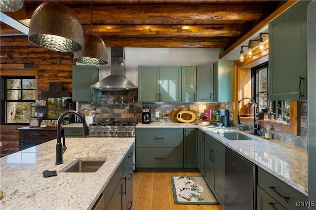 1392 Big Moose Rd, Webb, NY 13331 - kitchen with green cabinetry, wall chimney exhaust hood, stainless steel dishwasher, a sink, and beam ceiling