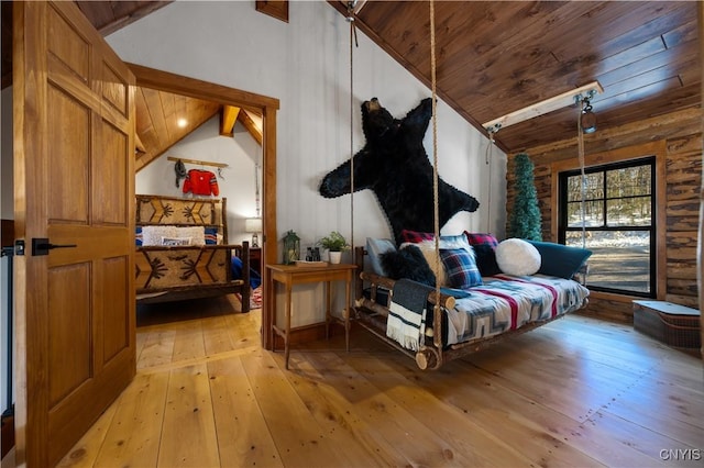1392 Big Moose Rd, Webb, NY 13331 - living room featuring vaulted ceiling, wooden ceiling, and light wood-style floors