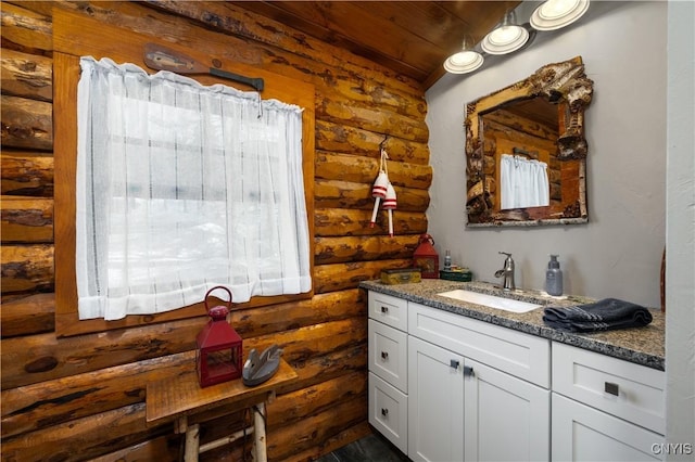 1392 Big Moose Rd, Webb, NY 13331 - bathroom featuring rustic walls and vanity