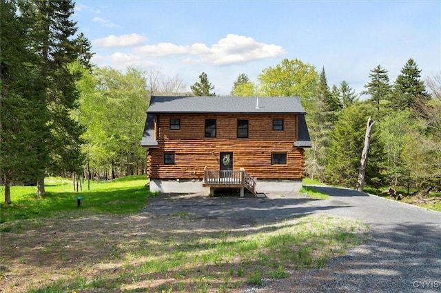 1392 Big Moose Rd, Webb, NY 13331 - back of property featuring log exterior
