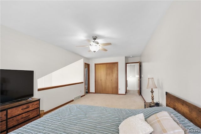 bedroom featuring a ceiling fan, carpet flooring, baseboards, and visible vents