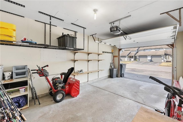 garage featuring a garage door opener