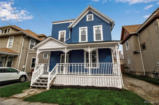 view of front of home featuring covered porch