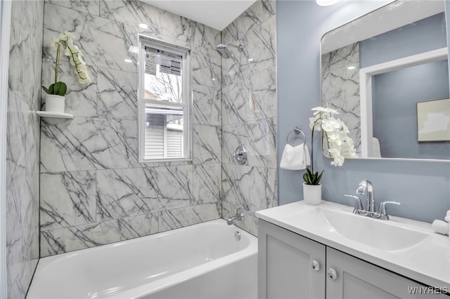 bathroom with vanity and shower / bathing tub combination