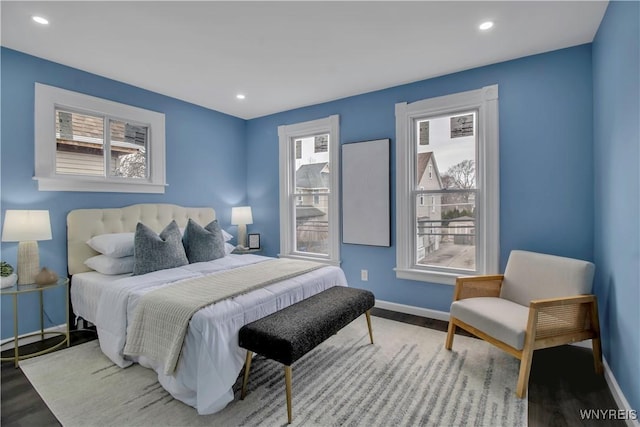 bedroom featuring recessed lighting, baseboards, and wood finished floors