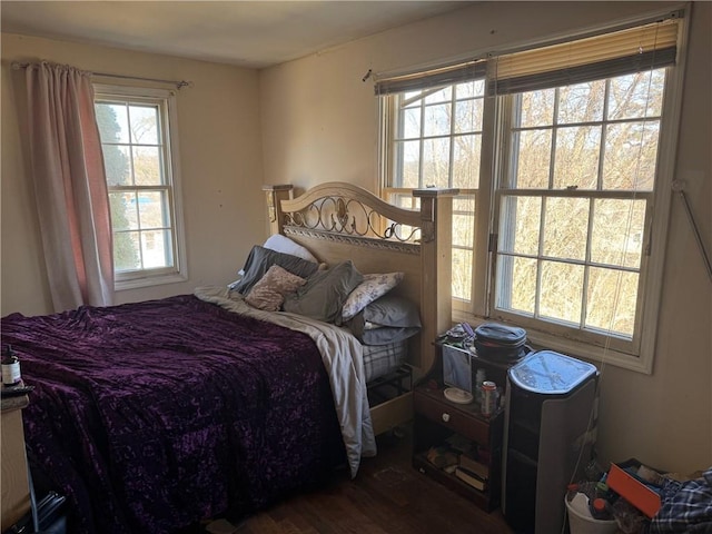 bedroom with wood finished floors