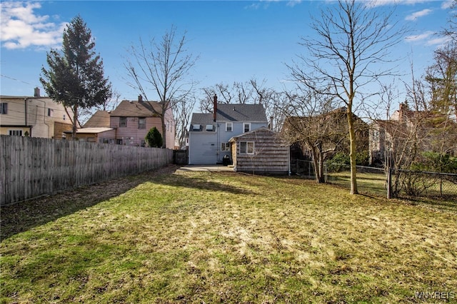 view of yard with a fenced backyard