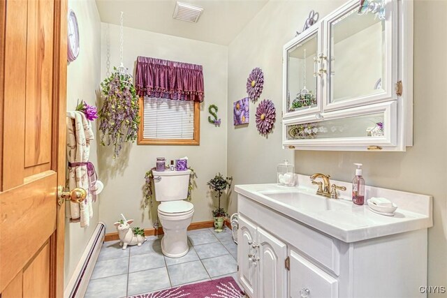 bathroom featuring visible vents, toilet, tile patterned floors, vanity, and a baseboard radiator