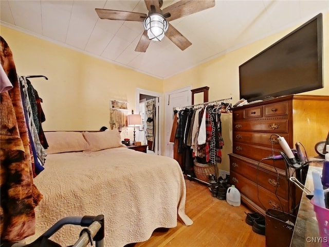 1644 Saint Agnes Ave, Utica, NY 13501 - bedroom with crown molding, ceiling fan, and wood finished floors