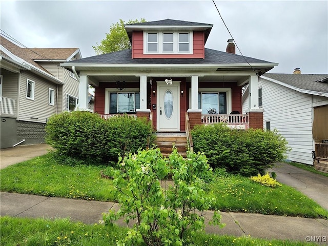 1644 Saint Agnes Ave, Utica, NY 13501 - bungalow with a porch, a shingled roof, and a chimney