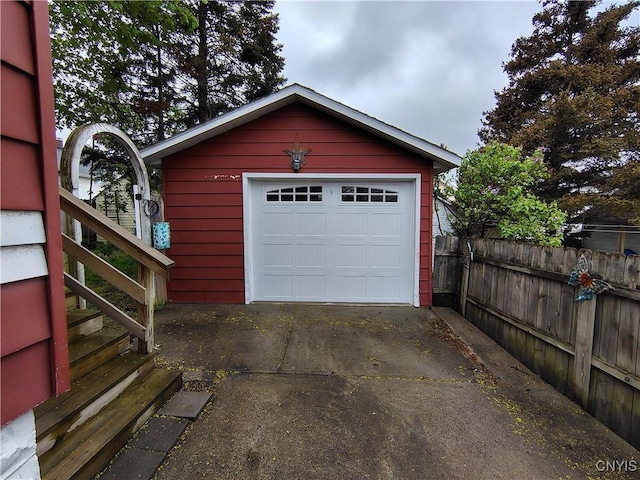1644 Saint Agnes Ave, Utica, NY 13501 - detached garage with concrete driveway and fence