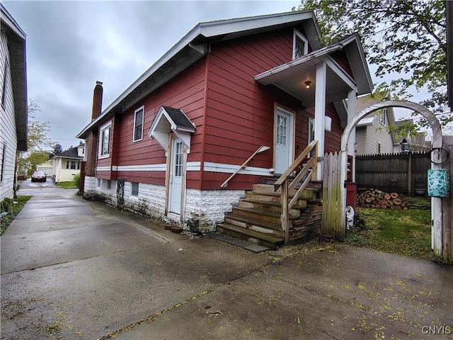 1644 Saint Agnes Ave, Utica, NY 13501 - view of property exterior with fence and a chimney