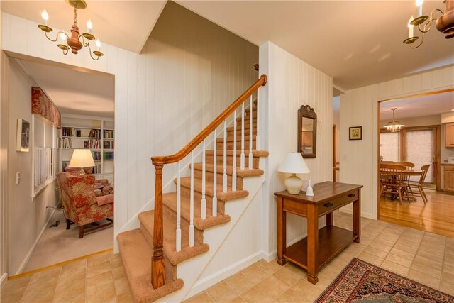 123 Sunset Ridge Rd, Otsego, NY 13326 - stairs with a chandelier and tile patterned floors