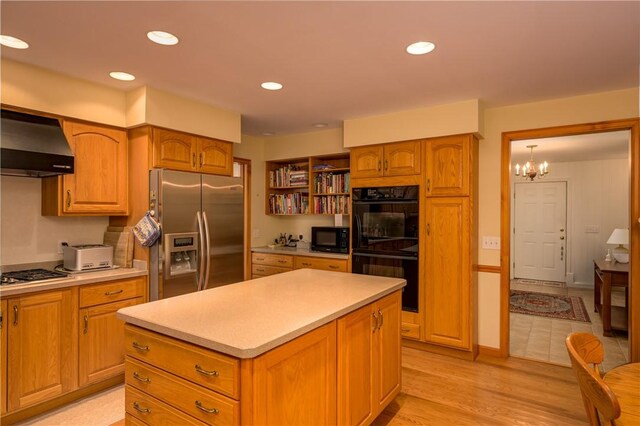 123 Sunset Ridge Rd, Otsego, NY 13326 - kitchen featuring wall chimney range hood, black appliances, light countertops, a chandelier, and recessed lighting