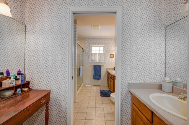 123 Sunset Ridge Rd, Otsego, NY 13326 - bathroom with tile patterned floors, vanity, a shower stall, and wallpapered walls