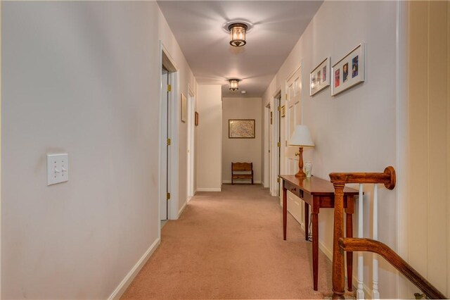 123 Sunset Ridge Rd, Otsego, NY 13326 - hall featuring light carpet and an upstairs landing