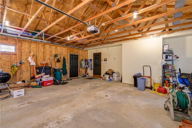 123 Sunset Ridge Rd, Otsego, NY 13326 - garage with a garage door opener